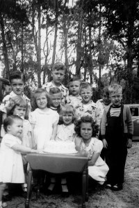 Dorsey-Ann, in front of the cake at her 6th birthday party